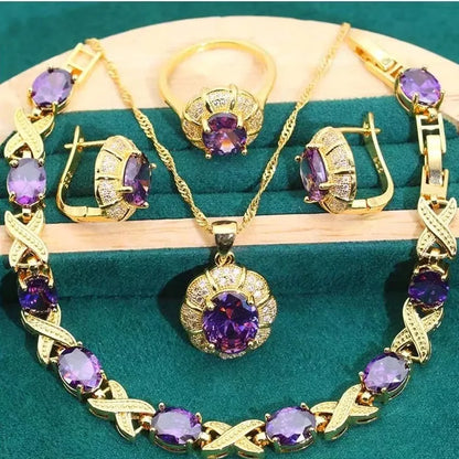 18k gold plated jewellery set with multi-colour synthetic cubic zirconia stones, including necklace, earrings, ring, and bracelet