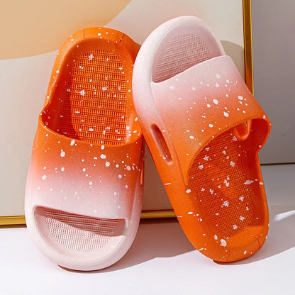 Gradient blue PVC slipper for children on a white background, showing non-slip sole.