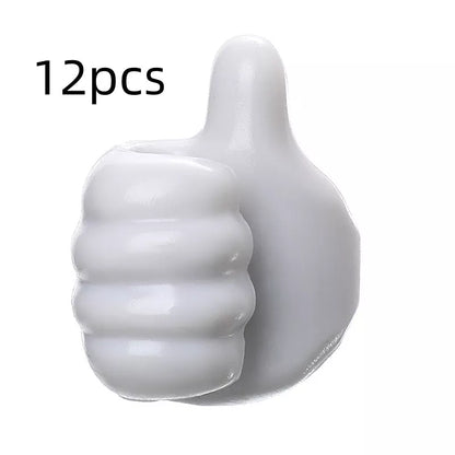 Silicone thumb wall hooks in various colors for organizing kitchen and bathroom items