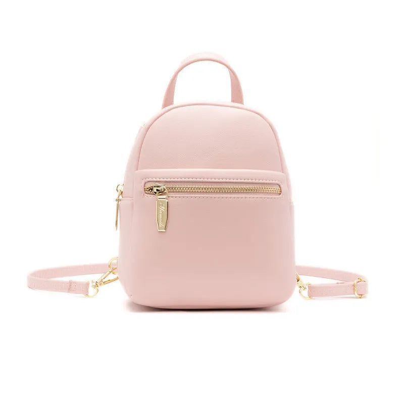 Soft PU mini backpack in multiple colours showing three-dimensional outer pockets and street style design.