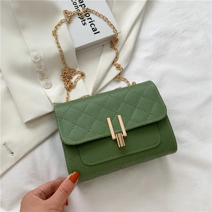 Women's solid colour PU leather crossbody bag with diamond lattice chain strap in black, green, or white.