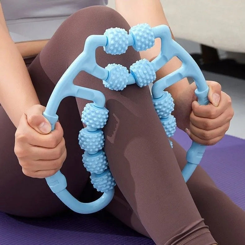 Ring clip leg massager roller with 12 wheels in macaron pink colour, showing adjustable grip and PP material construction