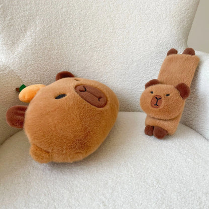 Khaki capybara car pillow in artificial plush with synthetic fibre filling, shown as a car neck pillow or shoulder cover.