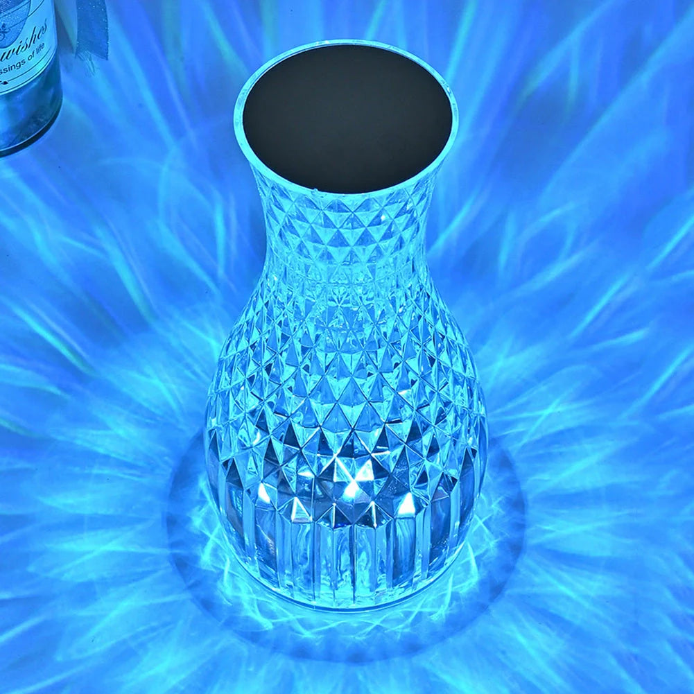 Vase Shape Crystal LED Table Lamp with remote control on a bedside table