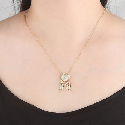 Gold color cubic zirconia heart pendant necklace on copper chain