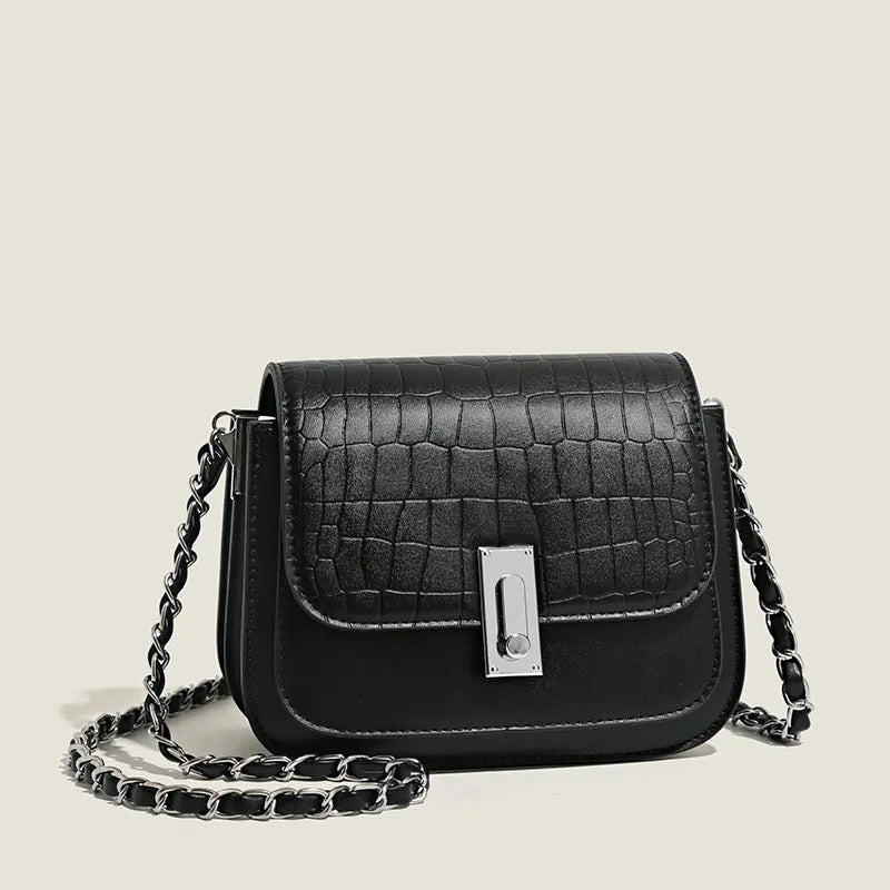 Women's soft PU shoulder bag with chain strap, horizontal square design in black colour showing sandwich pocket