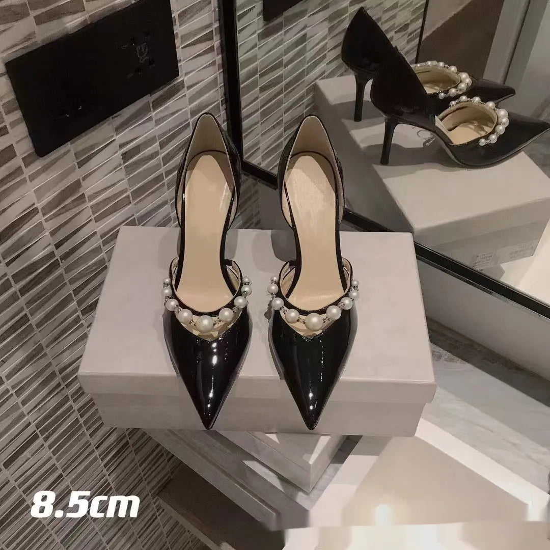 Women's pointed toe patent leather look stiletto high heels in nude, black or white with sheepskin lining.