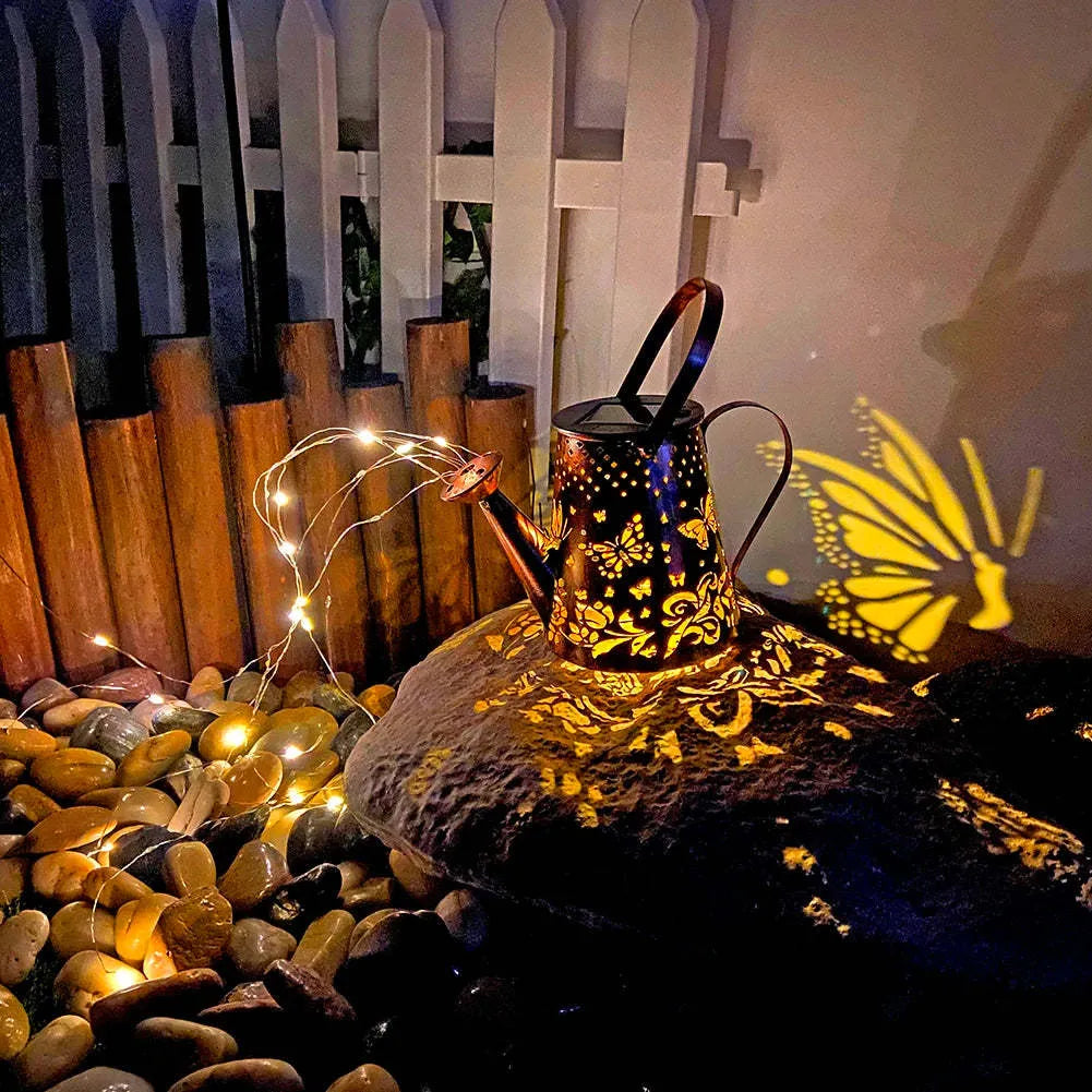Solar-powered garden lamp with tapered butterfly pattern iron design and warm white LED light