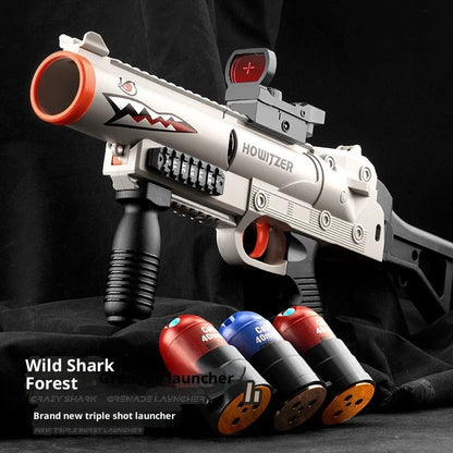 Three-series grenade launcher soft bullet gun in shark sand colour, showing 25cm length and textured grip surface