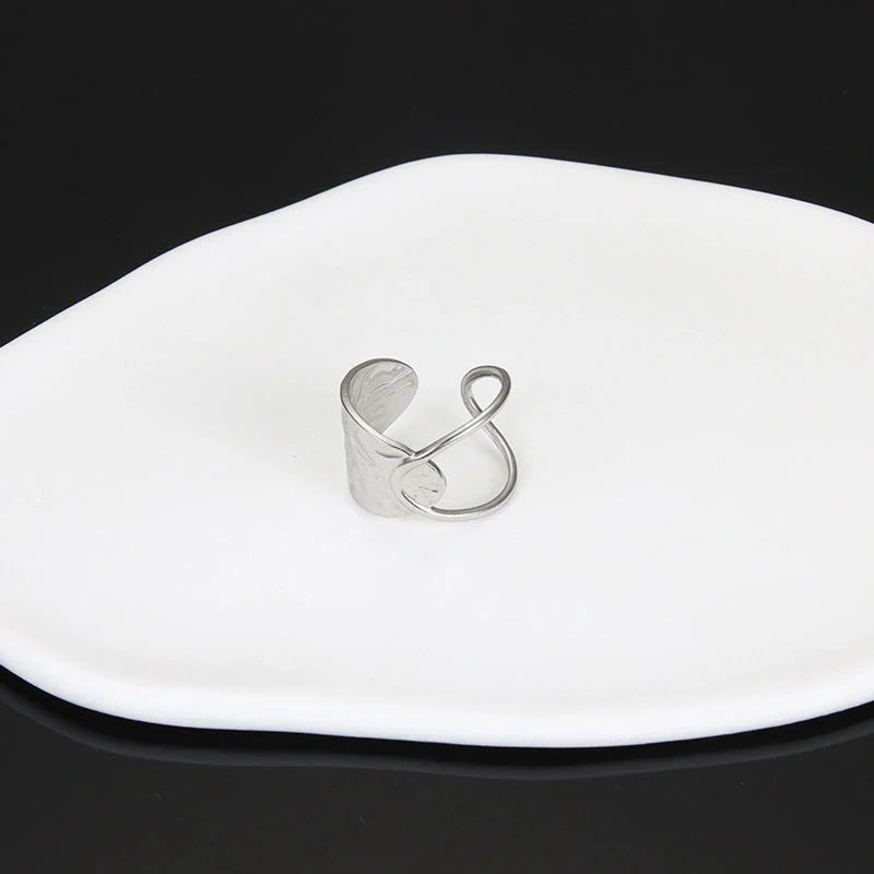 Adjustable stainless steel finger ring with unique charm designs in various colors