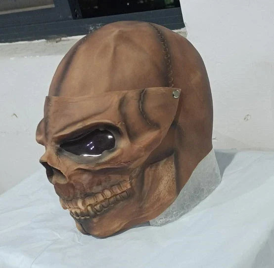 Detailed bronze skull Halloween mask with movable jaw, perfect for spooky Halloween parties and decor