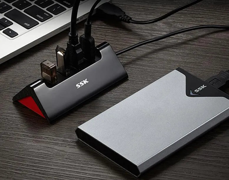 Black ABS plastic USB expansion dock with four USB ports and Micro USB power interface