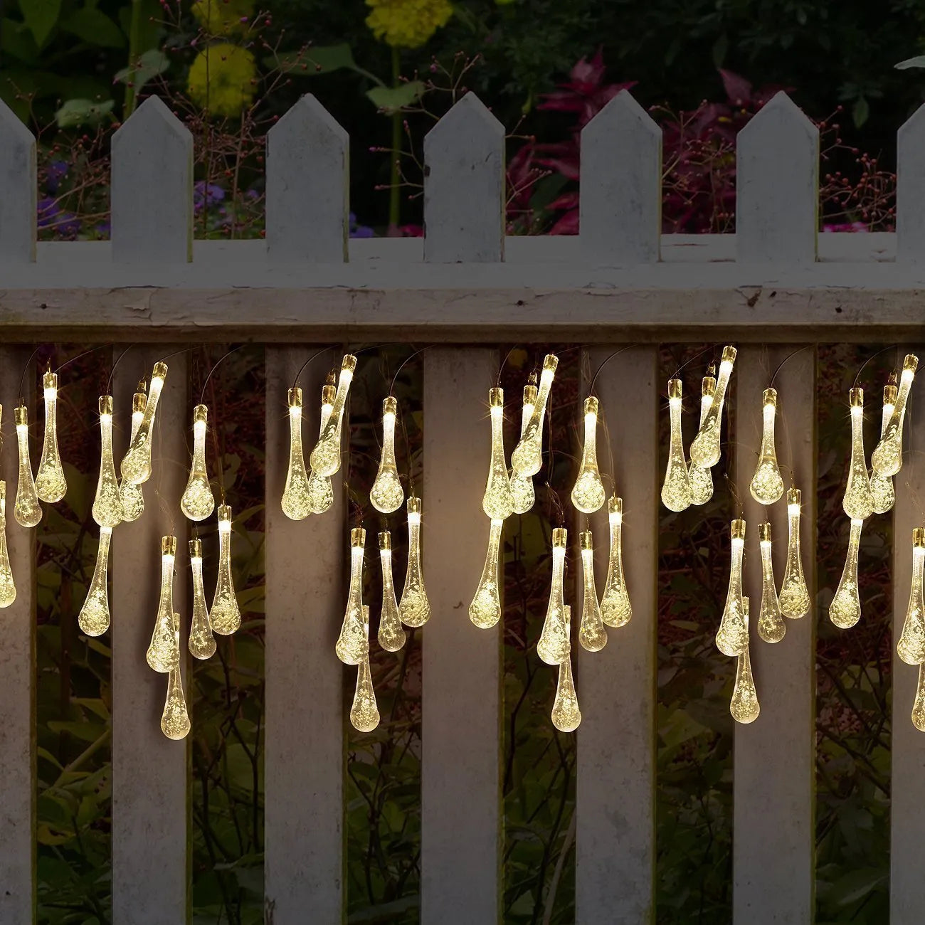 LED outdoor water drops solar string lights with bubble drop pendants on 6.5m cable, solar panel and ground spike included
