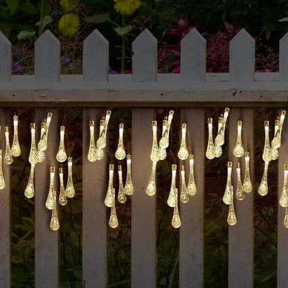 LED outdoor water drops solar string lights with bubble drop pendants on 6.5m cable, solar panel and ground spike included