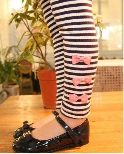Pink cotton girls clothing set shown in sizes for child heights 110cm to 140cm.