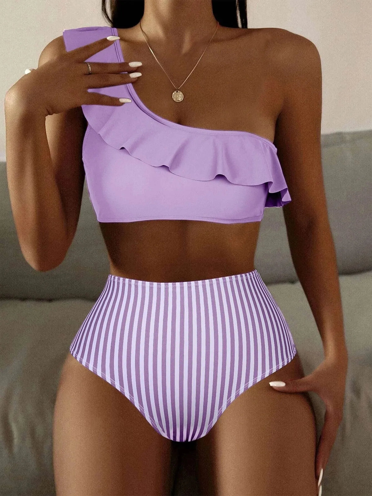 Women's striped and solid colour bikini swimsuit set shown in multiple colour options.