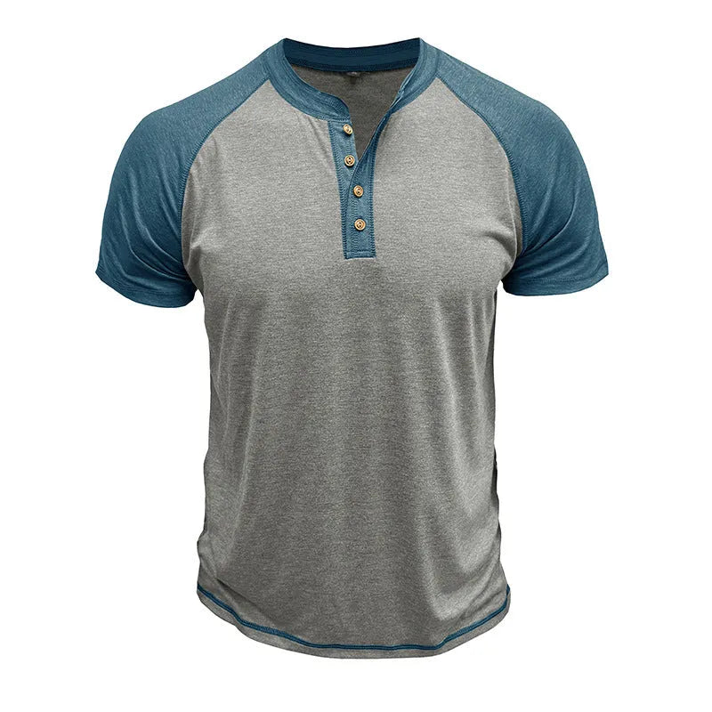 Man wearing a short sleeve colour block pullover with raglan sleeves in a green and khaki combination.