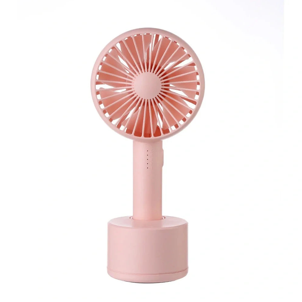 Blue shaking head handheld fan showing oscillating mechanism and USB charging port