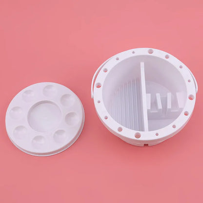 White plastic paint brush holder with 16.5 cm diameter, cake decoration clip style.