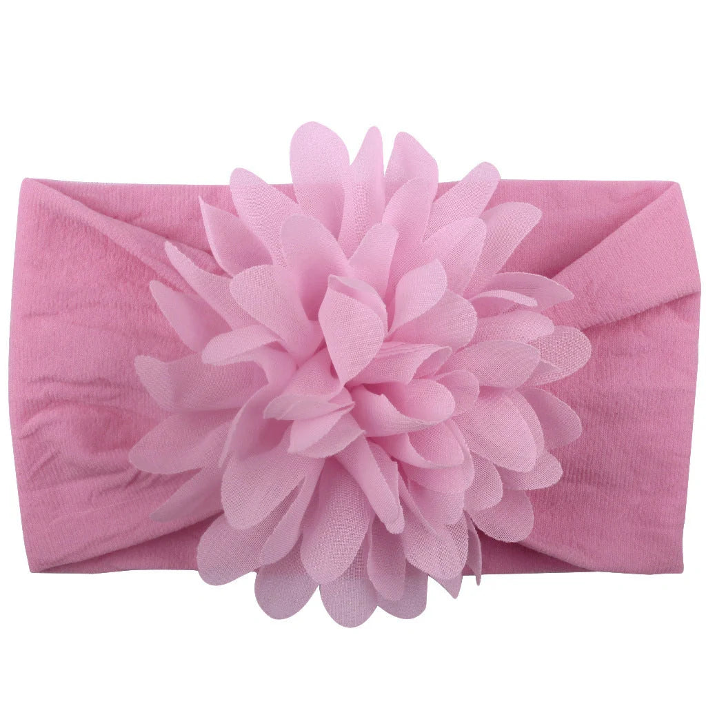 Adorable chiffon flower baby headband for your little princess, available in multiple colors.