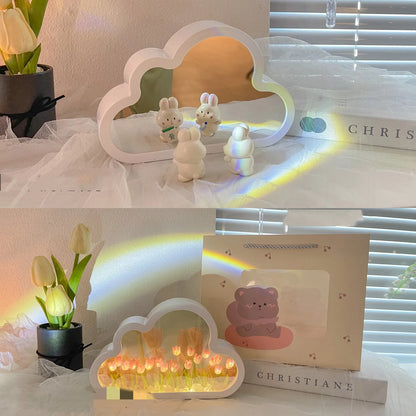 DIY tulip-shaped night lamp kit with LED lights and mirror surface in assorted colours on a desk.
