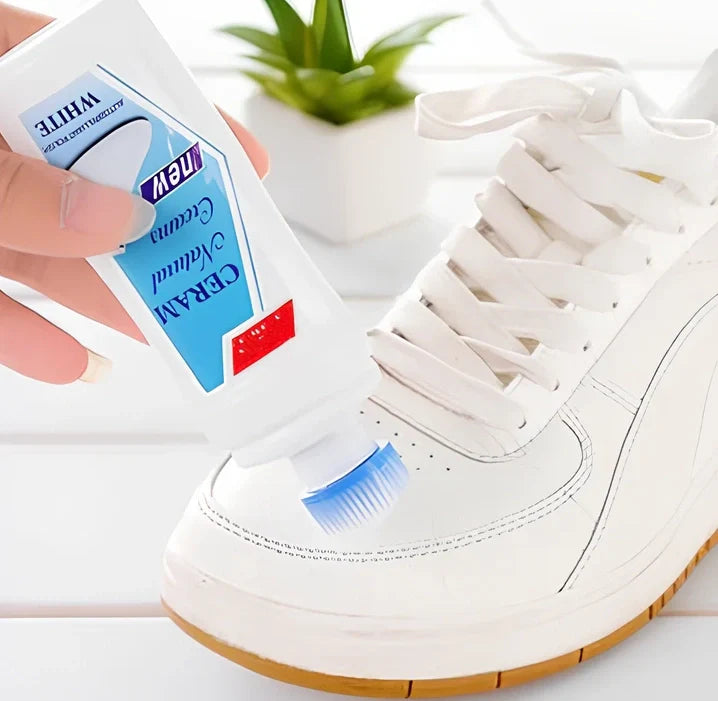 White liquid decontamination shoe cleaner bottle for stain removal and bacterial reduction on footwear