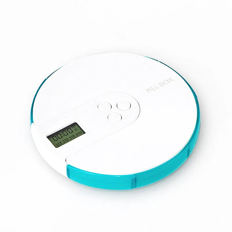 7-compartment alarm clock pill dispenser showing medication organisation with timer display