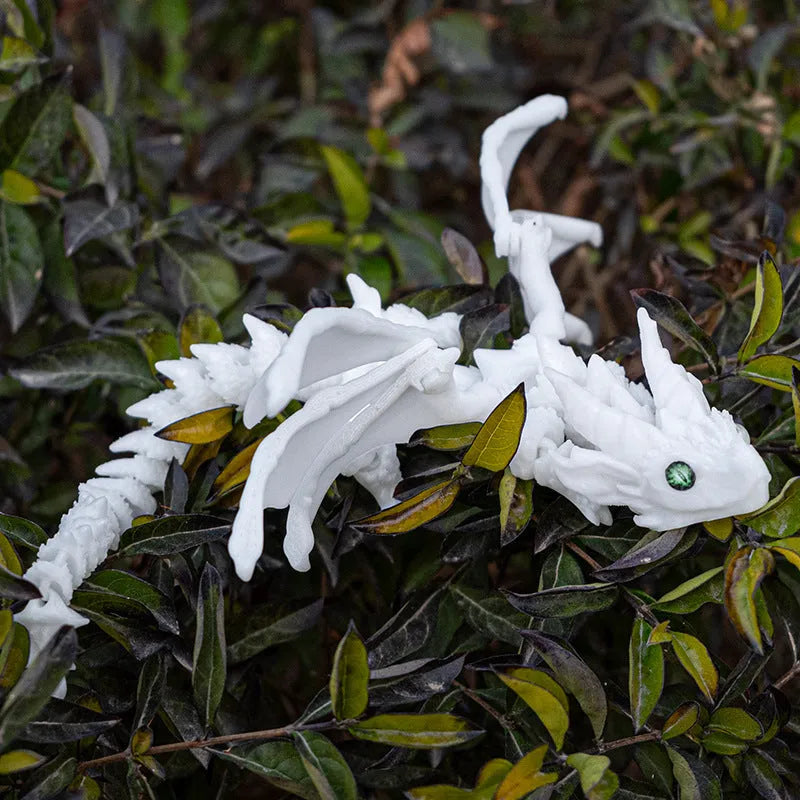 Red and gold 3D printed plastic dragon wings decoration for costumes.