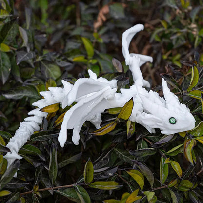 Red and gold 3D printed plastic dragon wings decoration for costumes.