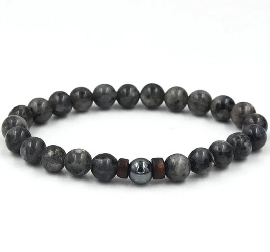Stylish men's bracelet made with natural volcanic stone, flash stone, and wood chip in a geometric, mosaic-like design