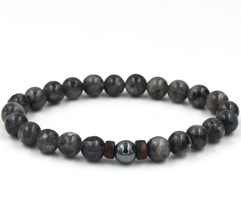 Stylish men's bracelet made with natural volcanic stone, flash stone, and wood chip in a geometric, mosaic-like design