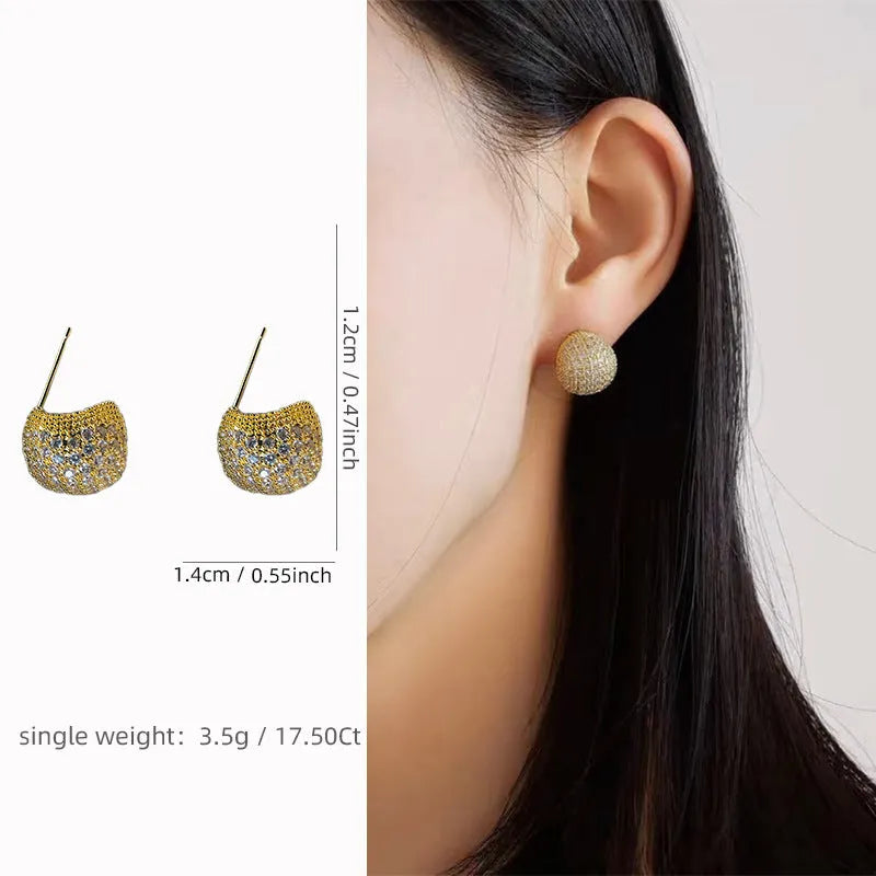 Geometric drop-shaped ear clips with full diamond design in gold or white colour options