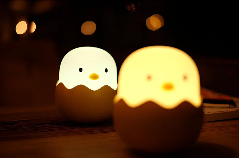 White egg shell chicken night light measuring 10.4cm with USB charging port and warm illumination
