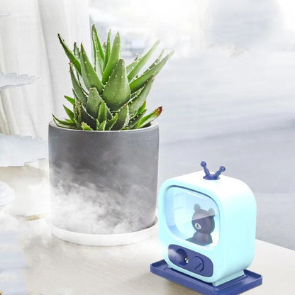 Compact USB mini air humidifier with night light in green, pink, and blue options