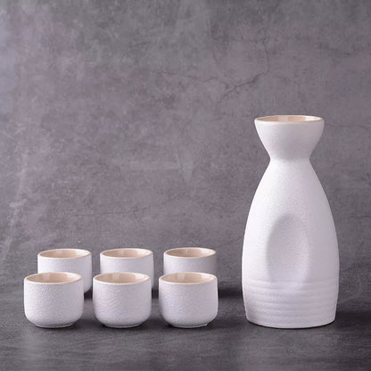 Sakura vintage sake set with ceramic kettle, wine glass, and triangle pot in traditional Japanese design