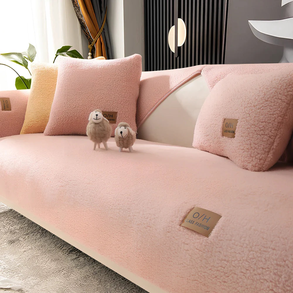 Lambswool sofa cushion with removable 45x45cm cover in solid beige colour on grey sofa