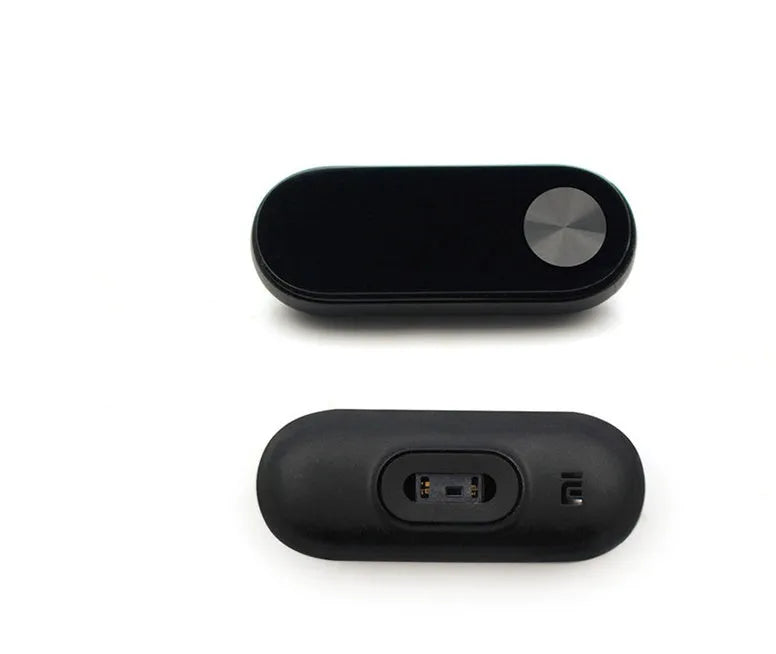 Xiaomi Mi Band 2 black fitness tracker with OLED display showing heart rate and time on adjustable wrist strap