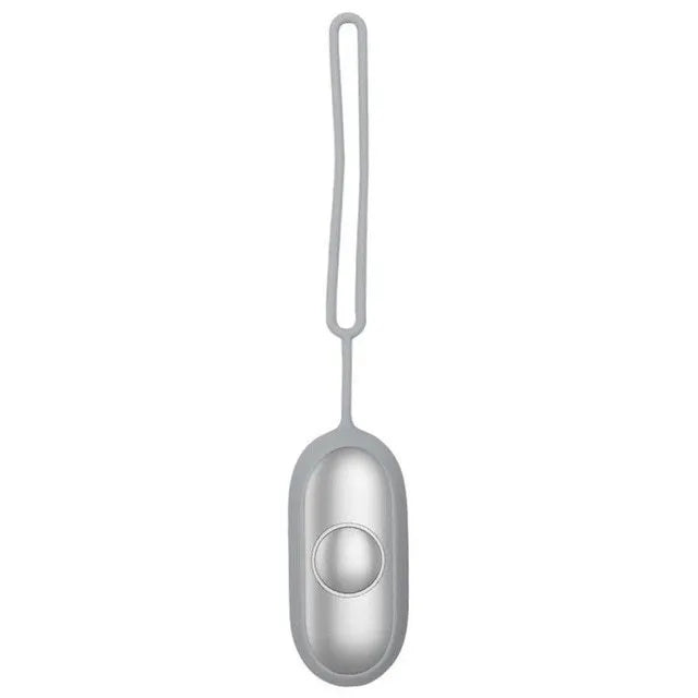 Hand-held micro-current sleep aid device in grey, green, and orange colour options