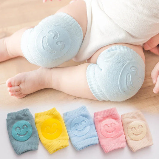 Cozy knee pads in various colors designed to protect babies during crawling with a non-slip, stretchy fit
