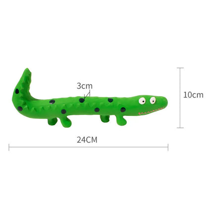 Green lizard-shaped dog chew toy with textured surface and squeaker, measuring 24cm long