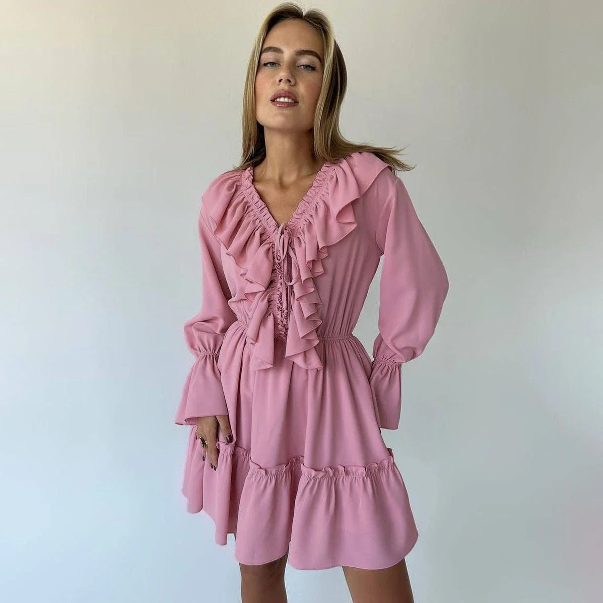 Stylish Y2K-inspired dress with pleated ruffles, flared sleeves, and a variety of vibrant color options