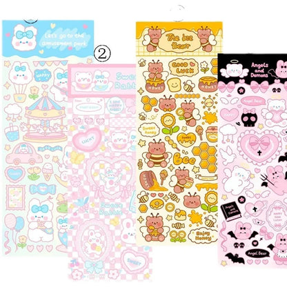 Assorted colourful cartoon PVC waterproof stickers on a sheet for notebook and planner decoration.