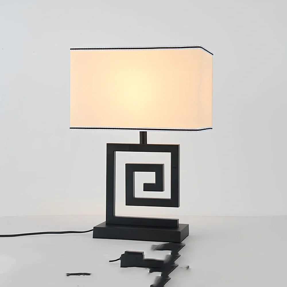 Retro style table lamp with fabric shade and iron base, remote control operation