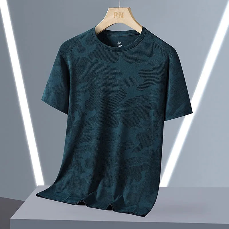 Men's loose fit camouflage nylon short sleeve summer top on a hanger