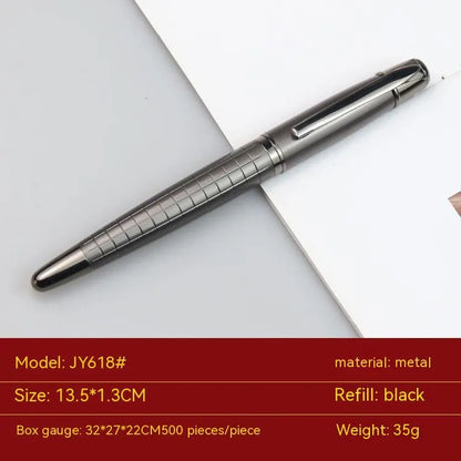 Gun grey metal rollerball pen with a metal barrel on a flat surface.