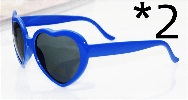 Stylish heart-shaped lighting sunglasses with a plastic frame and resin lenses, creating a mesmerizing effect for romantic occasions