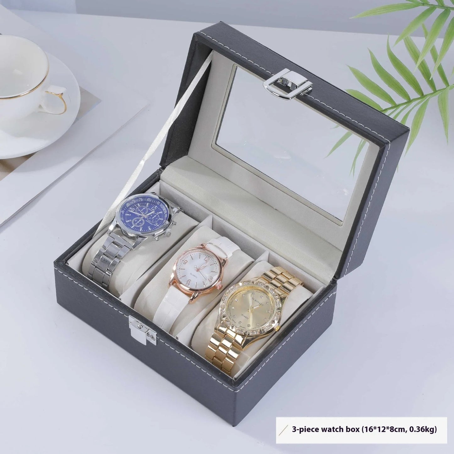 Grey high-grade leather watch storage box with transparent lid showing multiple watch compartments.