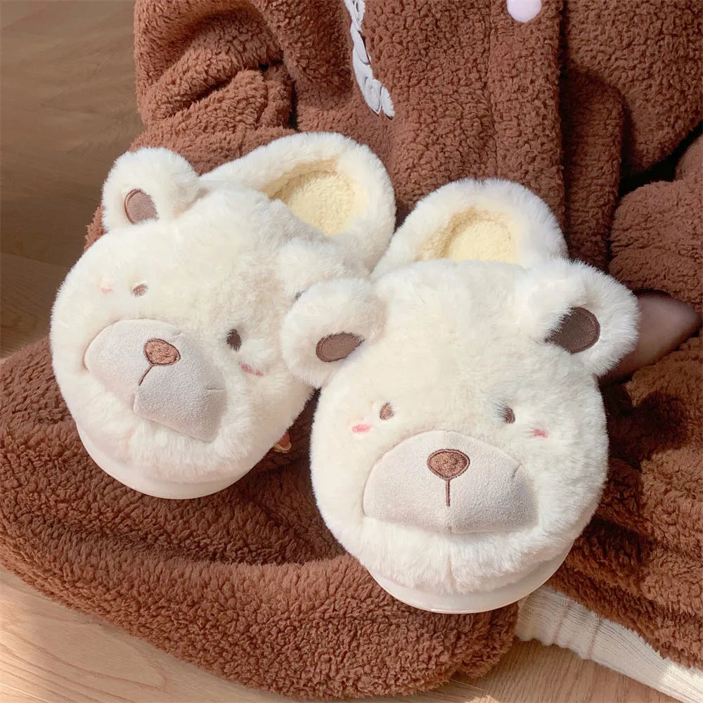 Women's plush suede slippers in cartoon design showing round toe and available colour options