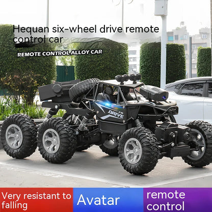 Children's remote control car with six wheels and 38cm climbing capability in black, gold, or red colours