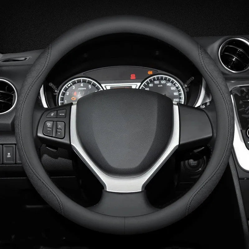 Car steering wheel cover in Napa leather texture with 38cm outer diameter and anti-slip rubber inner ring, classic black two-tone style for universal fit including Suzuki Alto, SX4, Swift, and Vitara models.